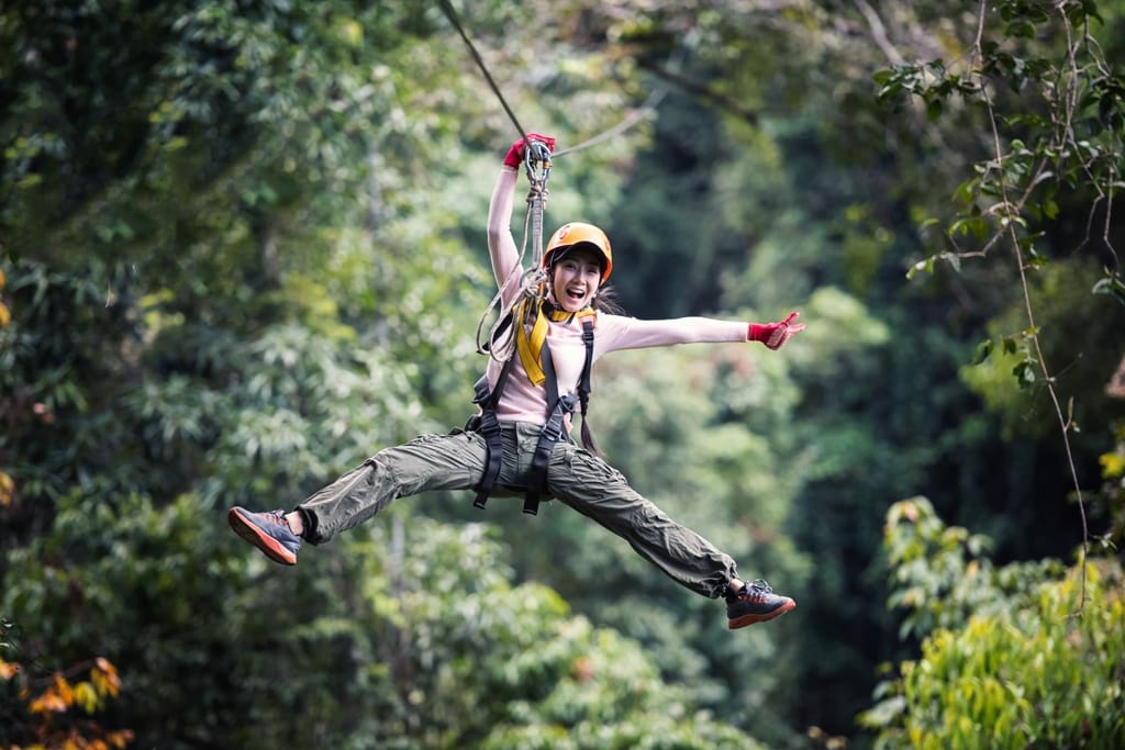 Woman On A Zip line
